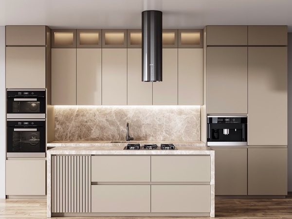 Beige handleless kitchen with a fluted island and a lit marble backsplash