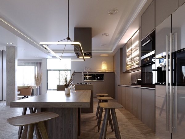 Taupe kitchen with tall cabinets, a dining island and a modern pendant light